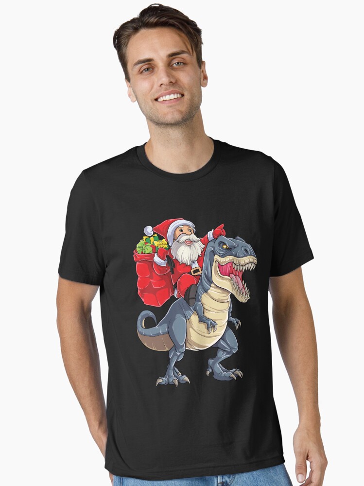 santa-riding-dinosaur-t-rex-t-shirt-christmas-gifts-x-mas-kids-boys-girls-man-women-unisex-t-shirt-d1ff4147-605871897153 Santa Riding Dinosaur T rex T Shirt Christmas Gifts X-mas Kids Boys Girls Man Women Unisex T-Shirt - Image 1